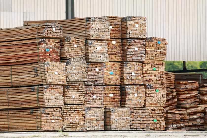 Stacks of wood fill a holding area of a wood-processing factory at the Kota Kinabalu Industrial Precinct (KKIP) in Sabah. After decades of relying on timber as a main export, the state government is now looking at developing a downstream niche in the oil and gas and palm oil industries.