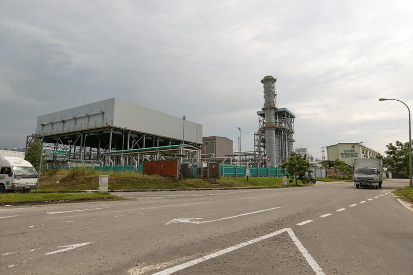 A lorry drives past one of the power plants that powers the Kota Kinabalu Industrial Precinct (KKIP) in Sabah. The state government is confident that the industrial park is self-sufficient enough to support further expansion of industries, including an upcoming RM700-million luxury car plant by Tan Chong Motor Holdings Bhd.