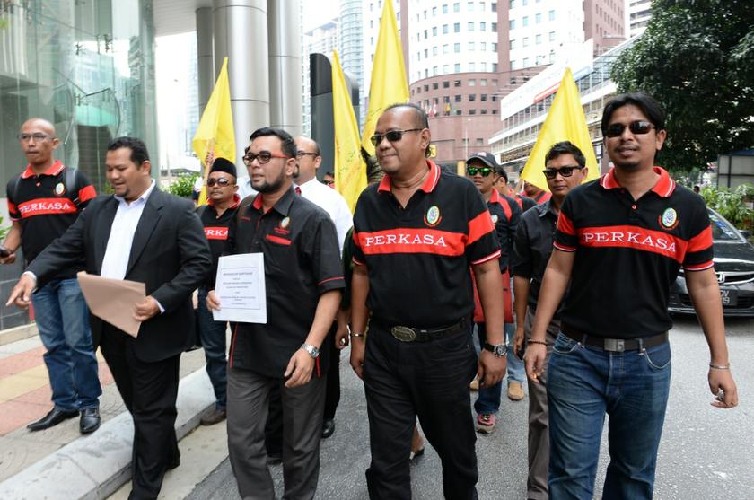 Members of Perkasa protesting over spy claims at the Singapore High Commission in Kuala Lumpur, November 27, 2013. — Picture by Saw Siow Feng