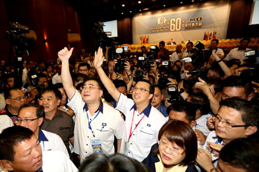 Datuk Seri Liow Tiong Lai (centre) has been announced as the new president of MCA, according to official results of the party election today. u00e2u20acu201d Picture by Saw Siow Feng
