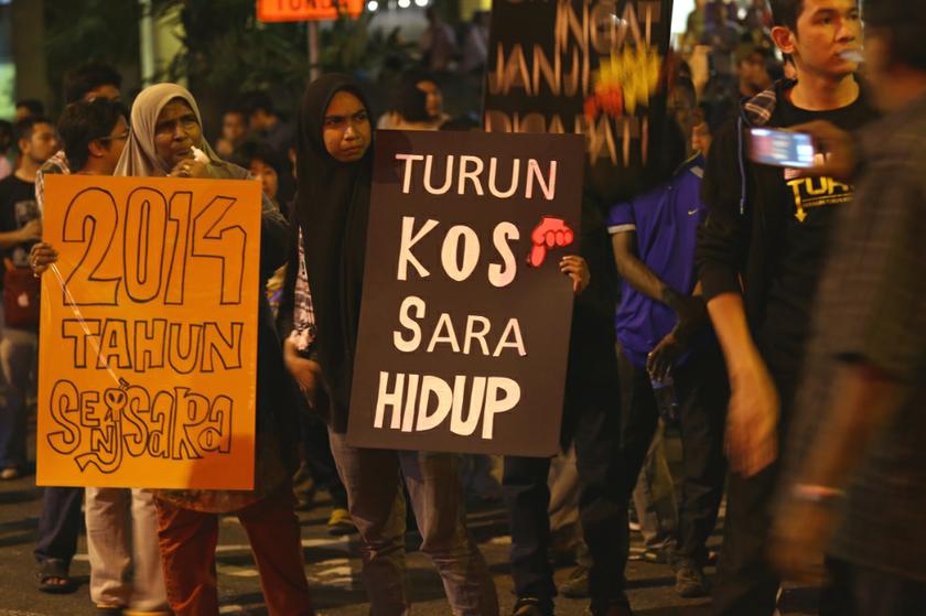 People hold banners during the ‘Turun’ anti-price hike rally in Kuala Lumpur December 31, 2013. — Picture by Saw Siow Feng