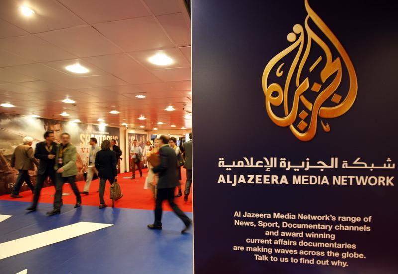 The logo of Al Jazeera Media Network is seen at the MIPTV, the International Television Programs Market, event in Cannes April 2, 2012. 