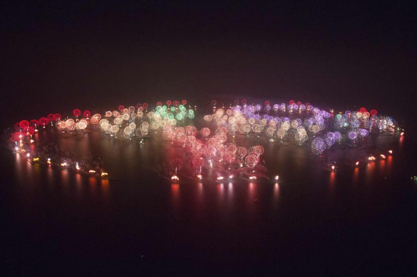 Fireworks explode in the sky across the whole of The Palm Jumeirah and the The World Islands during an attempt to break the Guinness World Record for the 'Largest Firework Display' in Dubai in this January 1, 2014 handout provided by the Dubai World Recor