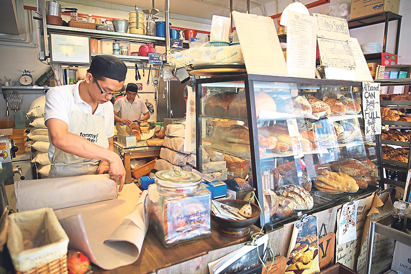 Be patient as you queue at the counter to order your breads, tarts and drinks