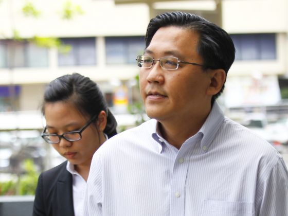 Assistant director of the Corrupt Practices Investigation Bureau Edwin Yeo, who was charged in July with 21 offences including misappropriation and forgery, arriving at the Subordinate court on Feb 20, 2014. u00e2u20acu201d TODAY pic