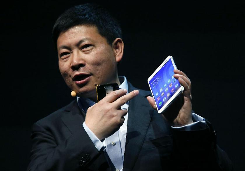 Richard Yu, Chairman of Huawei Device, its mobile phone division, shows the MediaPad X1, the world's slimmest 7-inch LTE Cat4-enabled all-in-one phablet, at a presentation before the start the Mobile World Congress in Barcelona February 23, 2014 Reuters