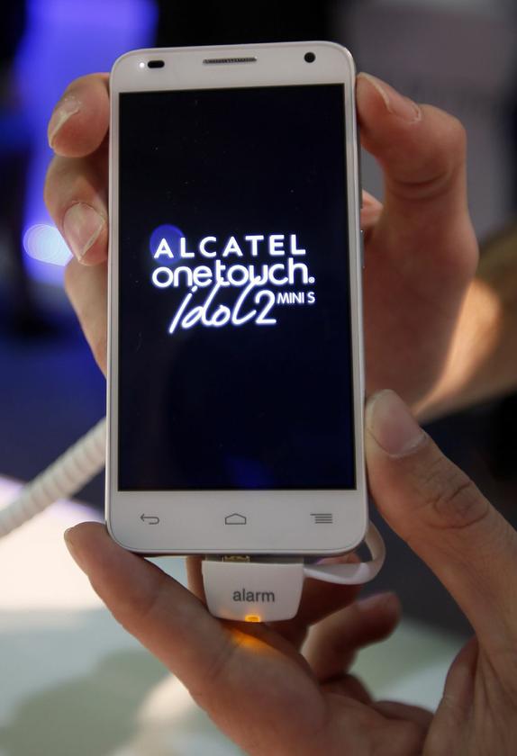 The Alcatel OneTouch Idol2 Mini S presented at the Mobile World Congress. — Reuters pic