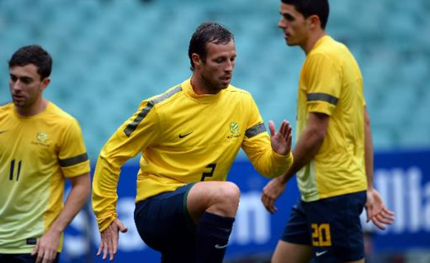 Australia captain Lucas Neill (centre) pictured during a training session in Sydney on November 18, 2013. u00e2u20acu201d AFP pic