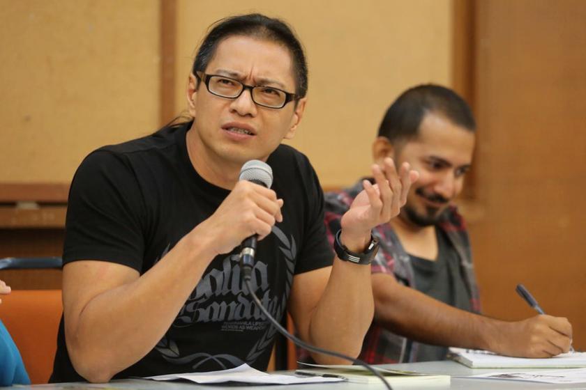 Azmi Sharom from Universiti Malaya's Faculty of Law and Hussain Sajad from the Assajjad movement at the CIJ 2012-2013 Freedom of Expression report at KLSCAH on February 20, 2014. u00e2u20acu201d Picture by Choo Choy May