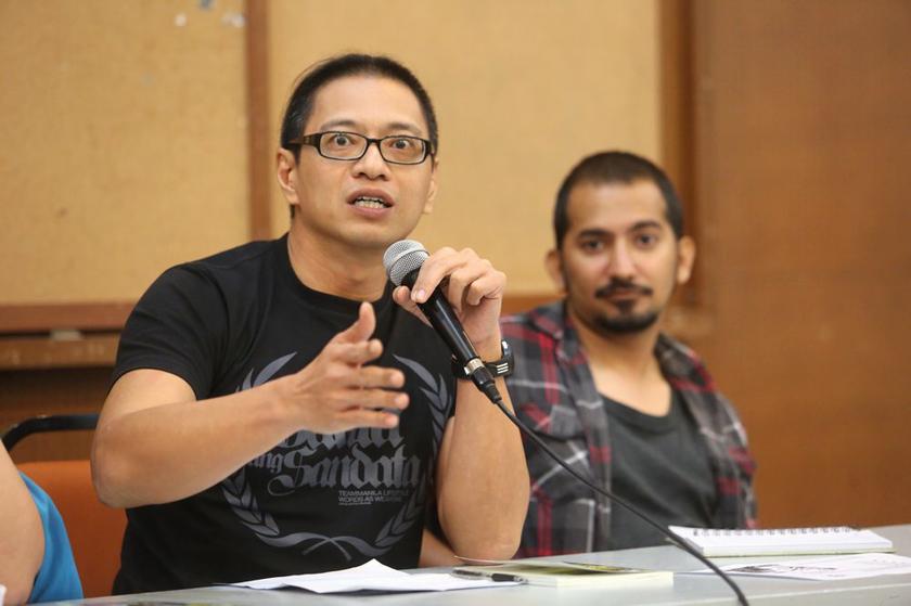 Azmi Sharom from Universiti Malaya's Faculty of Law and Hussain Sajad from the Assajjad movement at the CIJ 2012-2013 Freedom of Expression report at KLSCAH on February 20, 2014. u00e2u20acu201d Picture by Choo Choy May