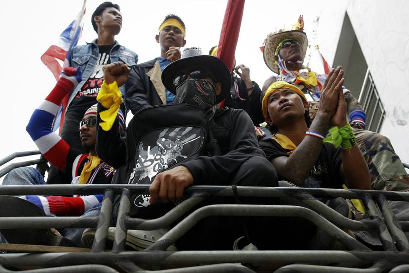 Anti-government protesters travel on a pick-up truck between different government institutions to protest in Bangkok February 24, 2014. u00e2u20acu2022 Reuters pic