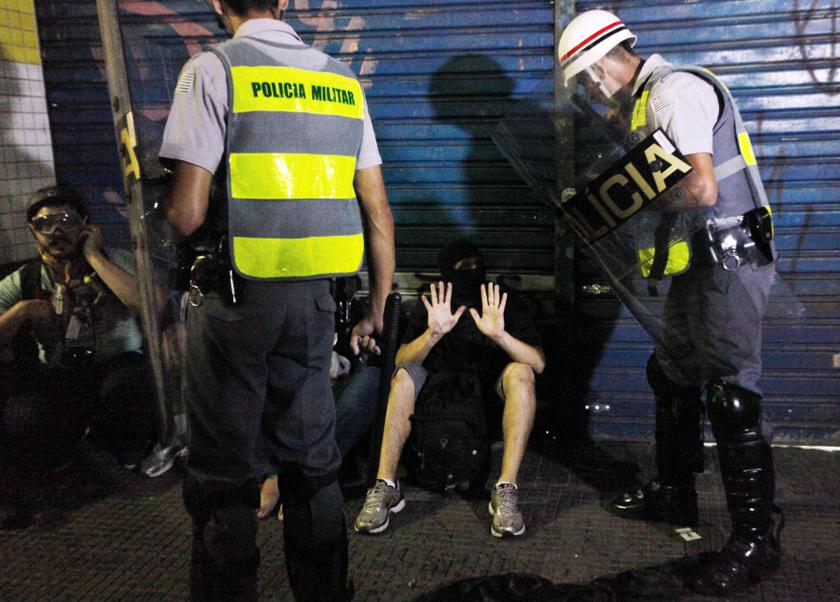 Police detain demonstrators during a protest against Brazil's hosting of the 2014 World Cup, in Sao Paulo February 22, 2014. u00e2u20acu201d Reuters pic