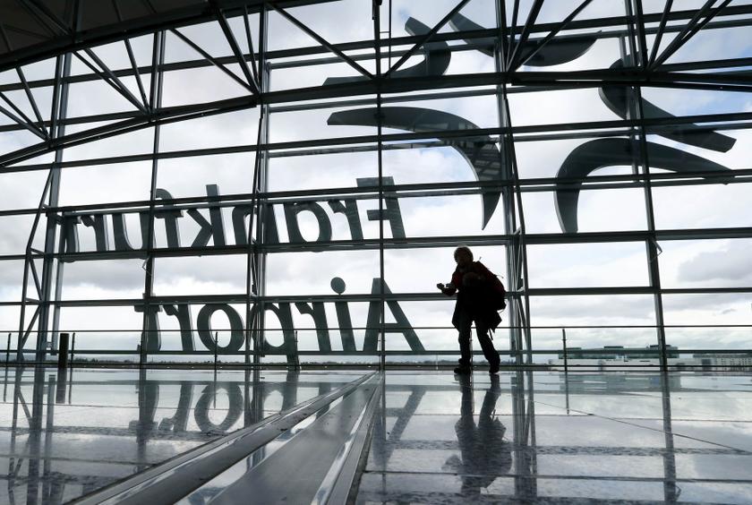 A passenger walks through a terminal during a strike at Frankfurt airport, February 21, 2014.  u00e2u20acu201d Reuters pic