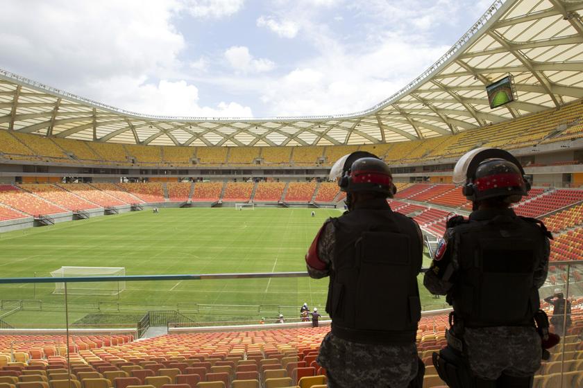 Riot police stand guard as FIFA's Secretary General Jerome Valcke tours the Arena Amazonia football stadium in Manaus, February 16, 2014. The stadium will host several matches of the 2014 World Cup. u00e2u20acu201d Reuters pic