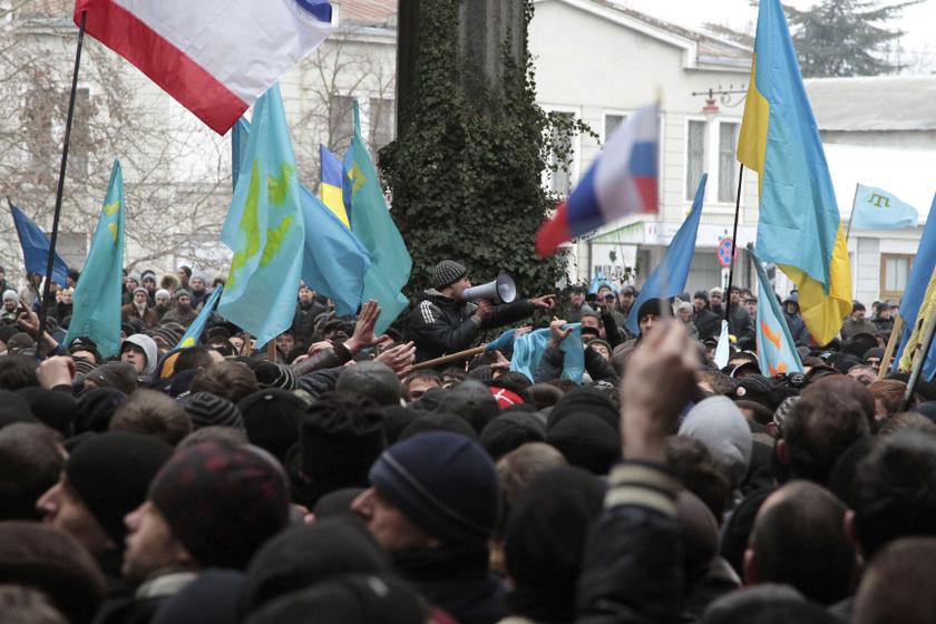 People attend rallies held by ethnic Russians and Crimean Tatars near the Crimean parliament building in Simferopol February 26, 2014. u00e2u20acu201du00c2u00a0Reuters pic