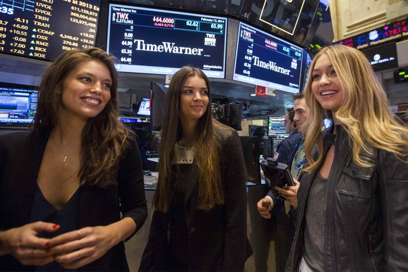 2014 Sports Illustrated Swimsuit models (from left) Emily DiDonato, Natasha Barnard and Gigi Hadid tour the floor of the New York Stock Exchange February 14, 2014. u00e2u20acu201d Reuters pic