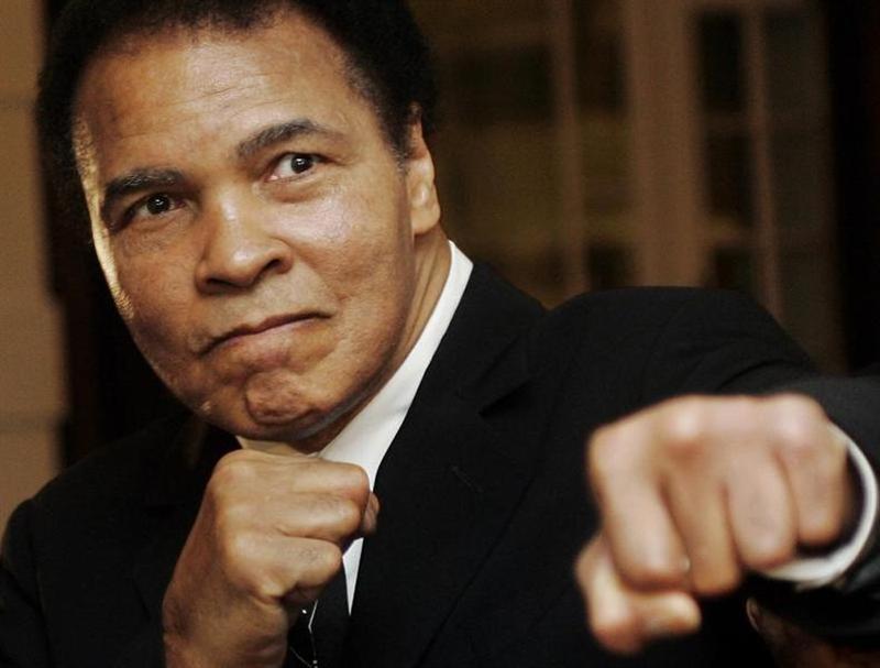 US boxing great Muhammad Ali poses during the Crystal Award ceremony at the World Economic Forum (WEF) in Davos, Switzerland January 28, 2006. u00e2u20acu201d Reuters pic