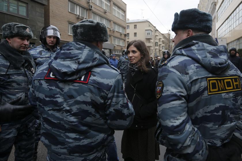 Nadezhda Tolokonnikova, a prominent member of the protest group Pussy Riot, speaks to police officers outside a courthouse in Moscow February 24, 2014. — Reuters pic