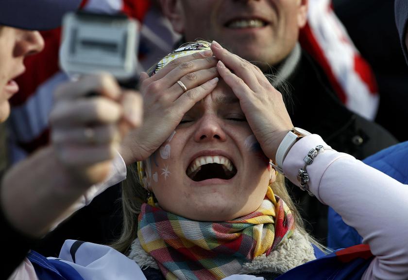 A Russian fan reacts during the menu00e2u20acu2122s quarter-finals ice hockey game between Russia and Finland at the 2014 Sochi Winter Olympic Games, February 19, 2014. u00e2u20acu201d Reuters pic