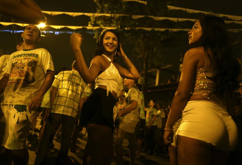 Brazilian dancers Jessica Gomes (centre) and Rafaela Pantoja (right) perform during the rehearsal of the Mocidade Independente Padre Miguel samba school in Rio de Janeiro, February 17, 2014, as a preparation for the 2014 Carnival parade.u00c2u00a0u00e2u20acu201d Reuters pic