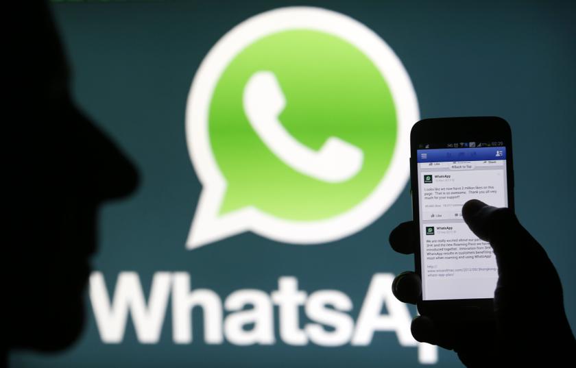 A Whatsapp App logo is seen behind a Samsung Galaxy S4 phone that is logged on to Facebook in the central Bosnian town of Zenica, February 20, 2014. u00e2u20acu2022 Reuters pic