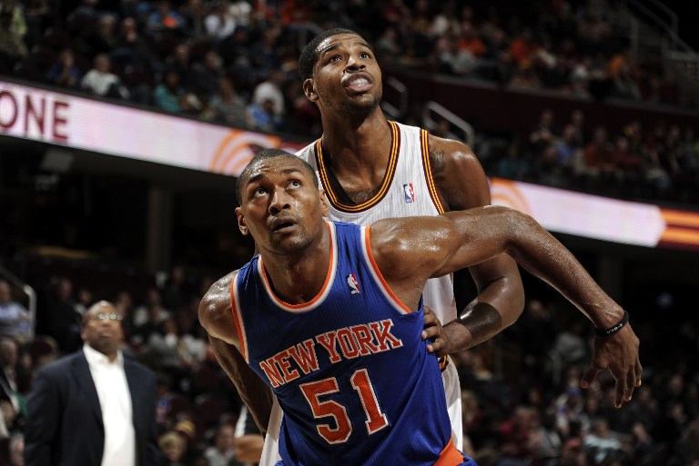 Metta World Peace (51) of the New York Knicks boxes out Tristan Thompson (13) of the Cleveland Cavaliers for the rebound at The Quicken Loans Arena on December 7, 2013 in Cleveland, Ohio. u00e2u20acu201d AFP pic