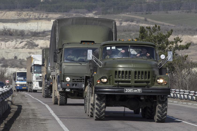 nRussian Army trucks drive on the road from Sevastopol to Simferopol in the Crimea region, March 1, 2014. u00e2u20acu2022 Reuters picn