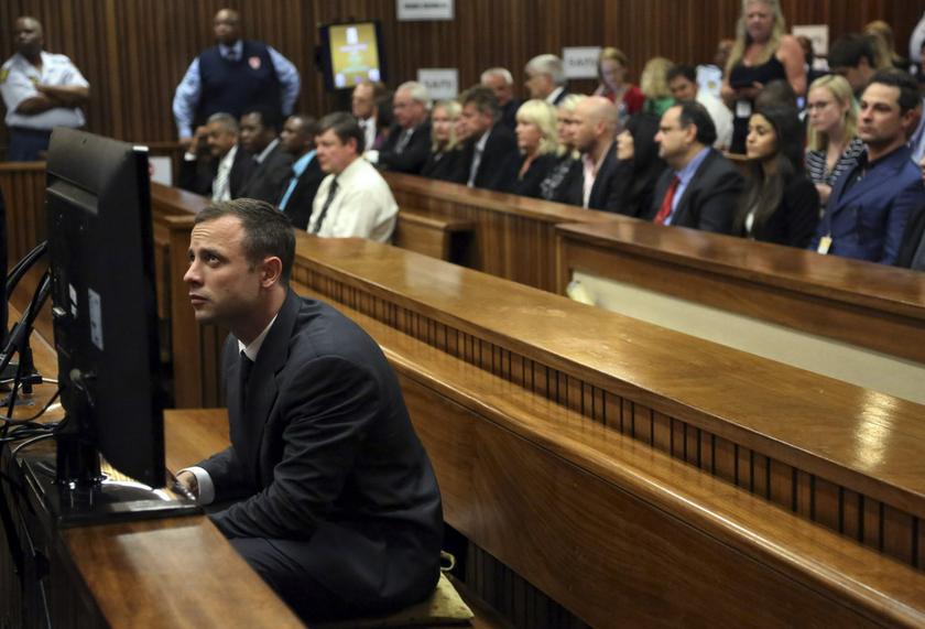 Oscar Pistorius sits in court ahead of his trial at the North Gauteng High Court in Pretoria March 3, 2014. — Reuters pic