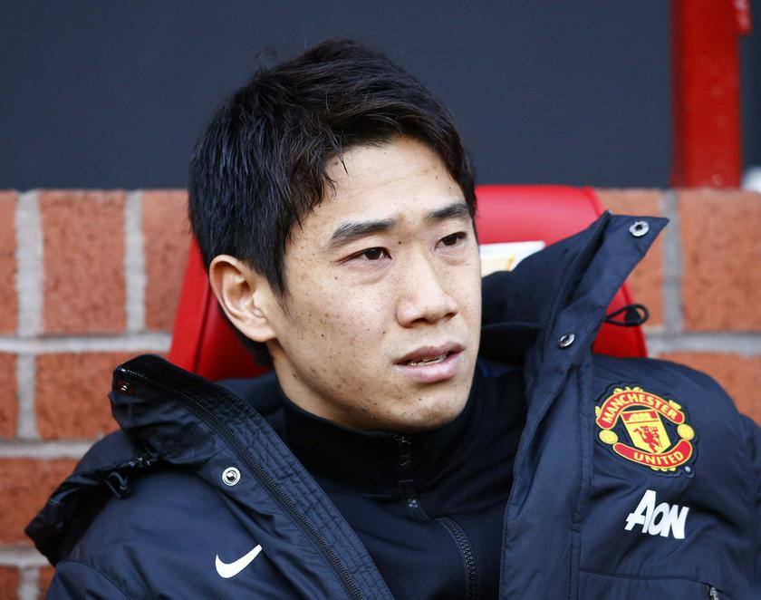 Manchester United's Shinji Kagawa sits on the bench before their English Premier League football match against Fulham at Old Trafford in Manchester, northern England, February 9, 2014.  u00e2u20acu201d Reuters pic