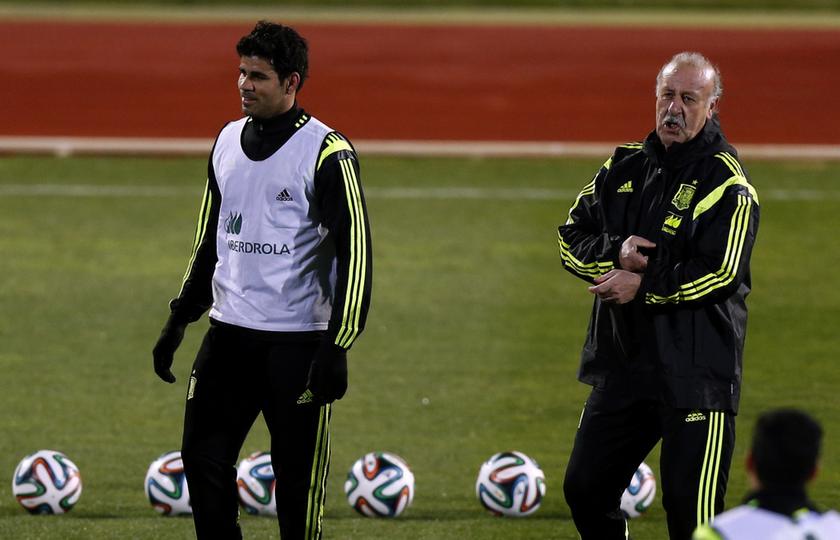 Spain's Diego Costa (right) stands beside coach Vicente del Bosque during a training session in Las Rozas, near Madrid March 3, 2014. u00e2u20acu201d Reuters pic