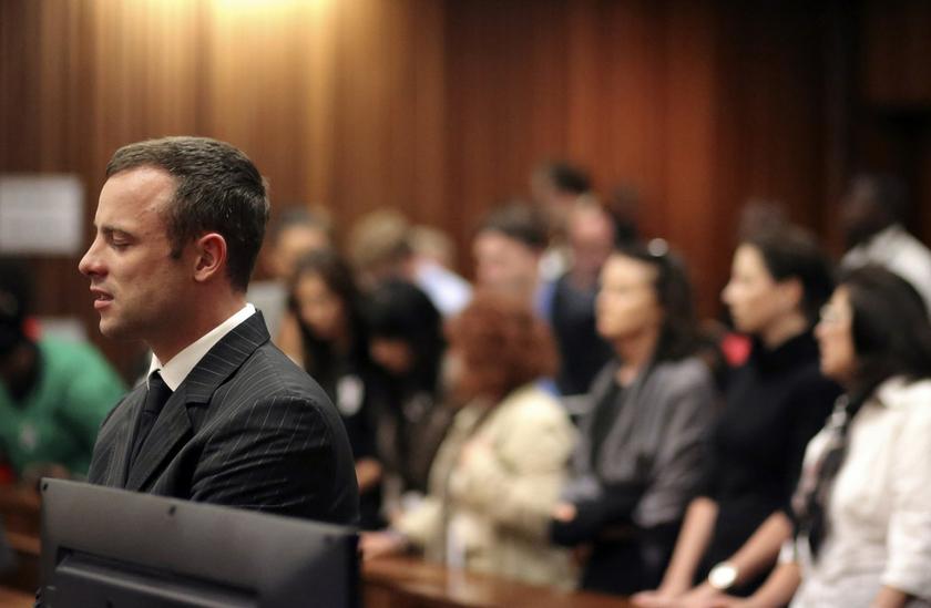 Olympic and Paralympic track star Oscar Pistorius reacts in the dock during his trial for the murder of his girlfriend Reeva Steenkamp, at the North Gauteng High Court in Pretoria, March 10, 2014. u00e2u20acu201d Reuters pic