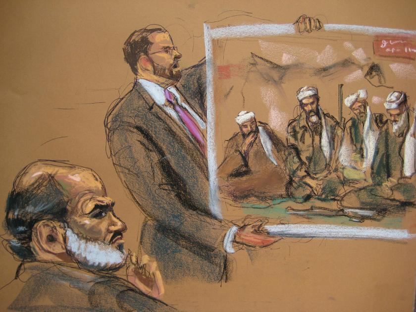 Suleiman Abu Ghaith (left), a son-in-law of Osama bin Laden, is shown in this courtroom sketch, sitting during his trial as assistant US Attorney Nicholas Lewin holds a photo showing Bin Laden and Abu Ghaith, in Manhattan Federal Court in New York March 5