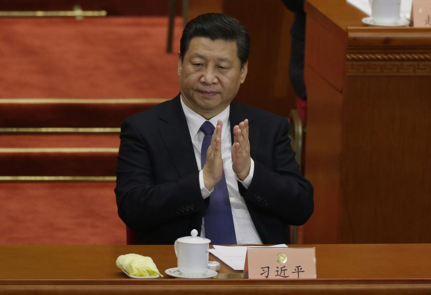 China's President Xi Jinping claps during the Chinese People's Political Consultative Conference (CPPCC) at the Great Hall of the People in Beijing March 3, 2014. u00e2u20acu201d Reuters pic
