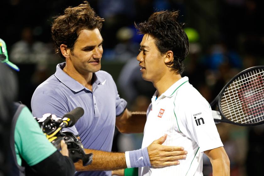 Kei Nishikori (right) shakes hands with Roger Federer (left) after their match on day ten of the Sony Open at Crandon Tennis Center. Nishikori won 3-6, 7-5, 6-4. u00e2u20acu201d Reuters/Today pic