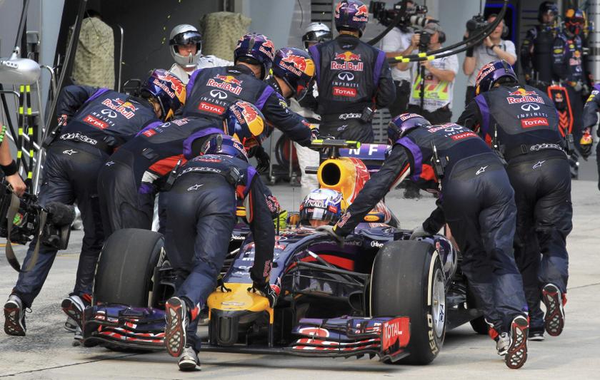 Red Bull Formula One driver Daniel Ricciardo of Australia has his car pushed back to the garage during the Malaysian F1 Grand Prix at Sepang International Circuit outside Kuala Lumpur, March 30, 2014.  u00e2u20acu201d Reuters pic