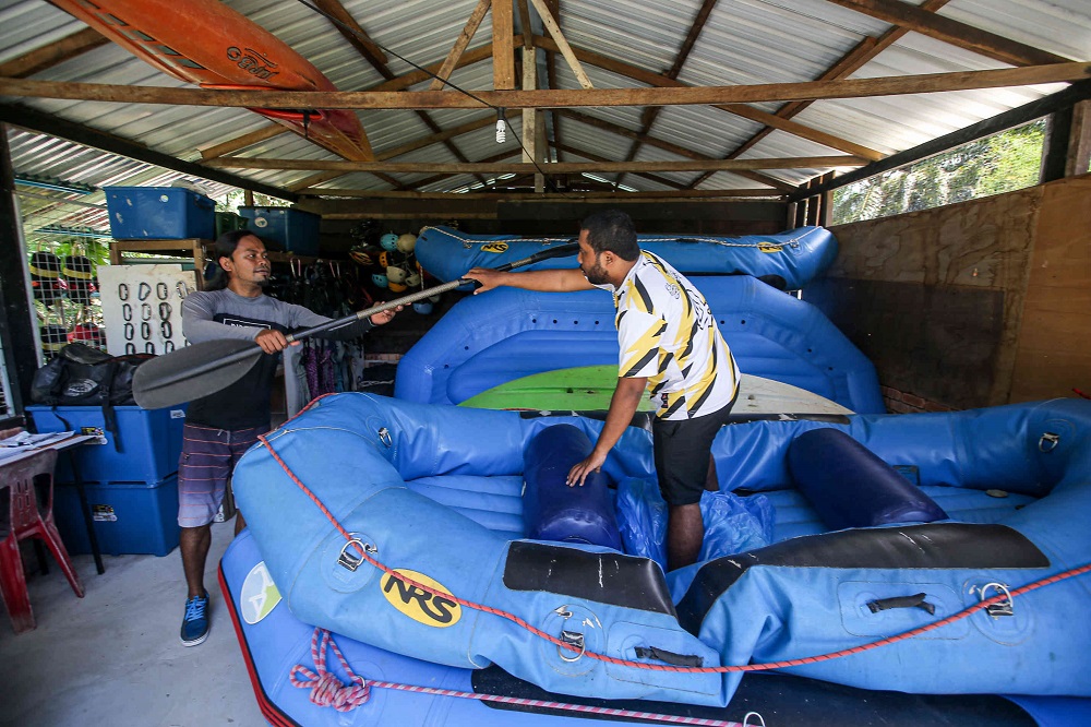 Muhd Syafiq Yusoff (right) said they were supposed to participate in two white water rafting competitions this year but due to Covid-19, the competitions had been postponed. u00e2u20acu201d Picture by Farhan Najib