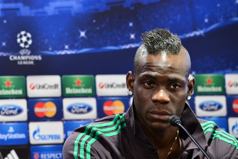 AC Milan's forward Mario Balotelli gives a press conference, on the eve of the Champions League football match between AC Milan and Atletico Madrid, February 18, 2014. u00e2u20acu201d AFp pic