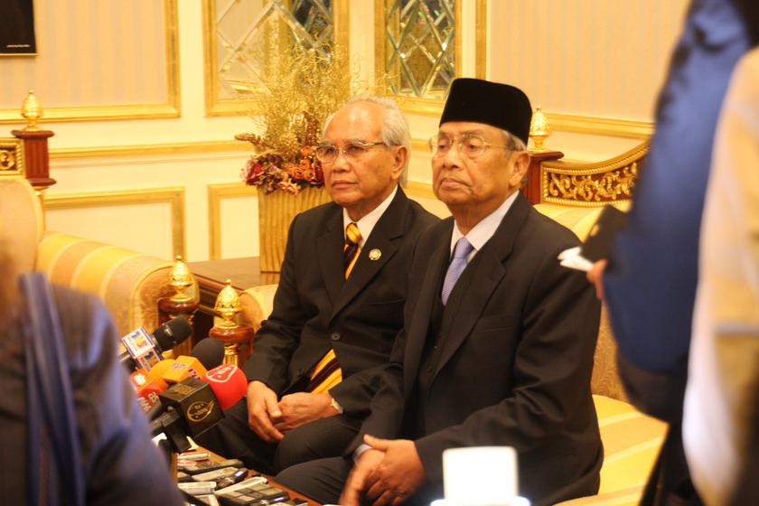 Sarawak Chief Minister Tan Sri Adenan Satem (seated, right).  