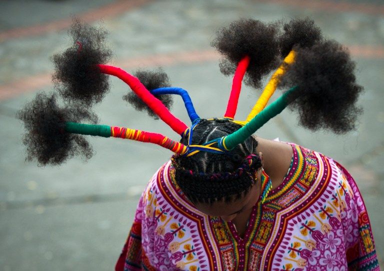 A woman presents an Afro hairstyle in this file photo. u00e2u20acu201d AFP pic