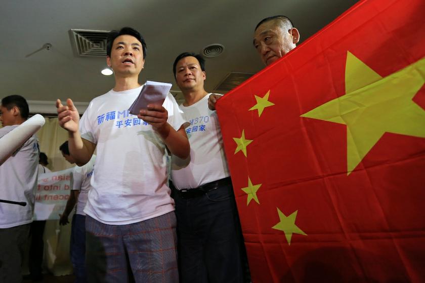 Relatives of the missing MH370 Chinese passengers stage a protest at the Subang Jaya Holiday Villa, March 30, 2014. u00e2u20acu201d Picture by Saw Siow Feng