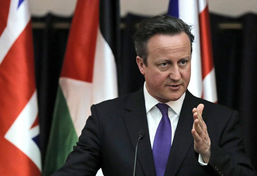 British Prime Minister David Cameron at a joint news conference with Palestinian President Mahmoud Abbas (not in picture) in the West Bank town of Bethlehem March 13, 2014 Reuters