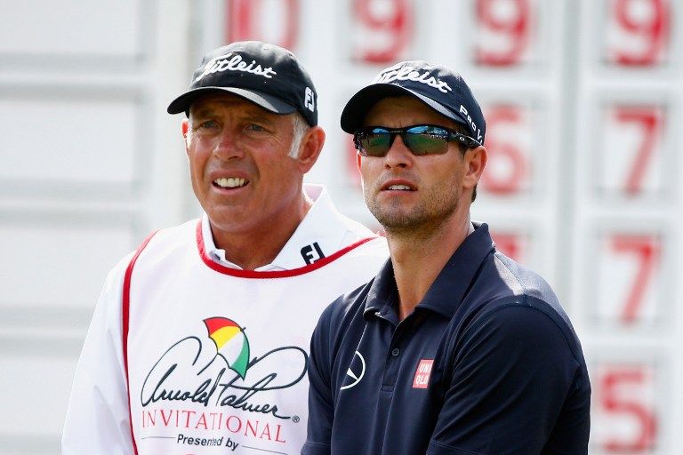 Adam Scott of Australia, with caddie Steve Williams (L), in the final round of the Arnold Palmer Invitational, Bay Hills Club and Lodge, March 23, 2014 in Orlando, Florida AFP