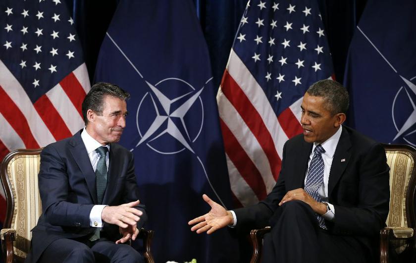 U.S. President Barack Obama (R) meets with NATO Secretary-General Anders Fogh Rasmussen in Brussels March 26, 2014 Reuters