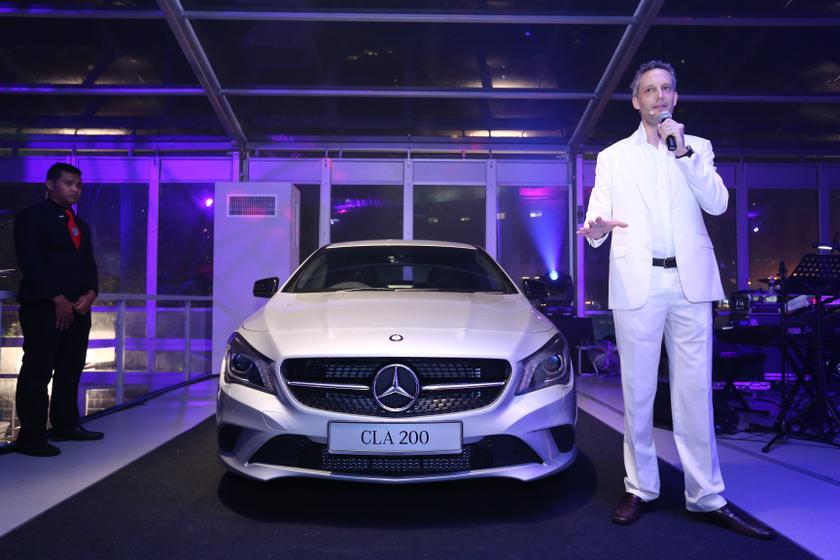 Kai Schlickum, Vice President, Sales & Marketing, Passenger Cars of Mercedes-Benz Malaysia with the new Mercedes-Benz CLA 200. u00e2u20acu201d Photo by YS Khong