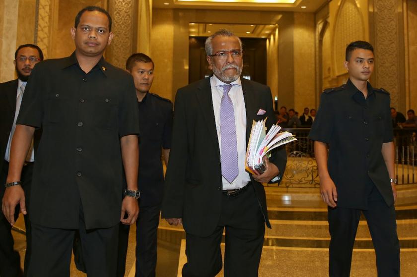 The governmentu00e2u20acu2122s lawyer Tan Sri Muhammad Shafee Abdullah arriving at the court for the Sodomy II trial on March 6, 2014. u00e2u20acu201d Picture by Saw Siow Feng