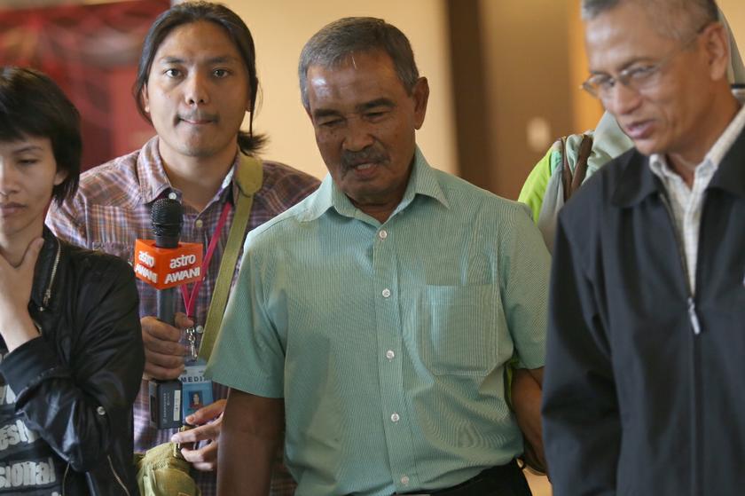 Ibrahim Abdul Razak, a relative of a passenger on the missing Malaysia Airlines Boeing 777-200 plane, reacts while speaking to the press in Sepang March 9, 2014. u00e2u20acu201d Picture by Saw Siow Feng