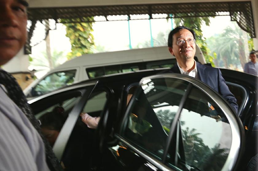 Chinau00e2u20acu2122s ambassador to Malaysia Dr Huang Huikang arrives at Cyberview Lodge to visit the family members of passengers on Malaysia Airlines flight MH370 in Cyberjaya on March 12, 2014. u00e2u20acu201d Picture by Saw Siow Feng