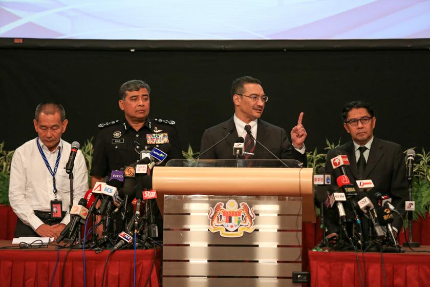 Acting Transport Minister Datuk Seri Hishammuddin Tun Hussein (second right) holds the daily MH370 press conference at PWTC, on March 25, 2014. u00e2u20acu201d Picture by Saw Siow Feng