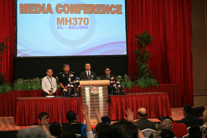 Acting Transport Minister Datuk Seri Hishammuddin Tun Hussein (second right) holds the daily MH370 press conference at PWTC, on March 25, 2014. u00e2u20acu201d Picture by Saw Siow Feng