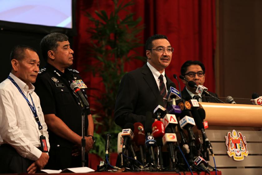 Acting Transport Minister Datuk Seri Hishammuddin Tun Hussein (second right) holds the daily MH370 press conference at PWTC, on March 25, 2014. u00e2u20acu201d Picture by Saw Siow Feng